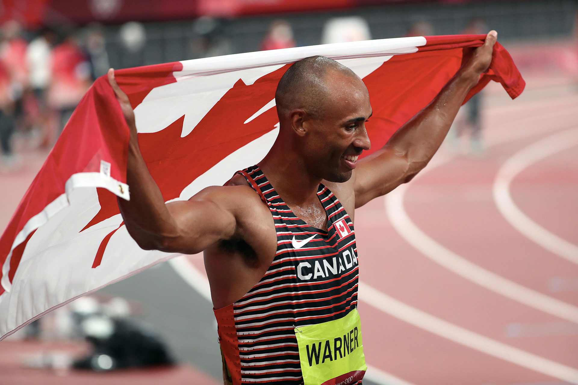 Damian Warner of Team Canada celebrate his gold medal during the Men&#x27;s Decathlon