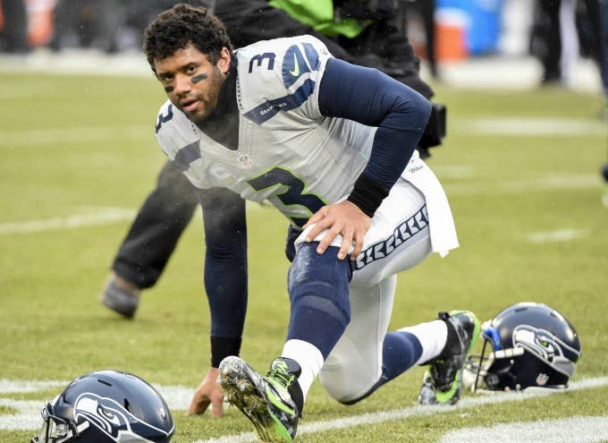 Russell Wilson warms up before a game.