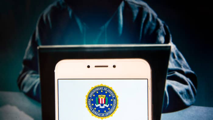 In this photo illustration, the Federal Bureau of Investigation Police (FBI) logo