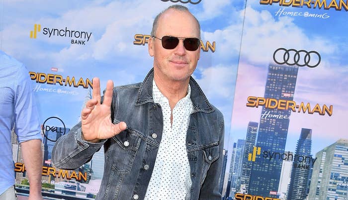 michael keaton holding up his hand like a legend