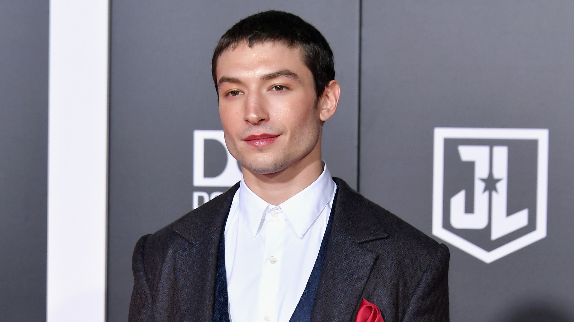 Ezra Miller is pictured on the red carpet