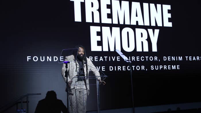 tremaine emory is seen at a speech event