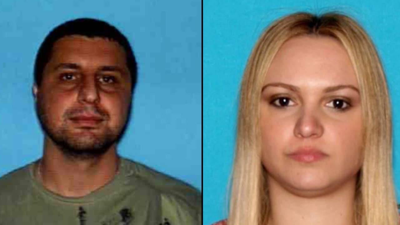 Two people on the run are seen in mugshots.