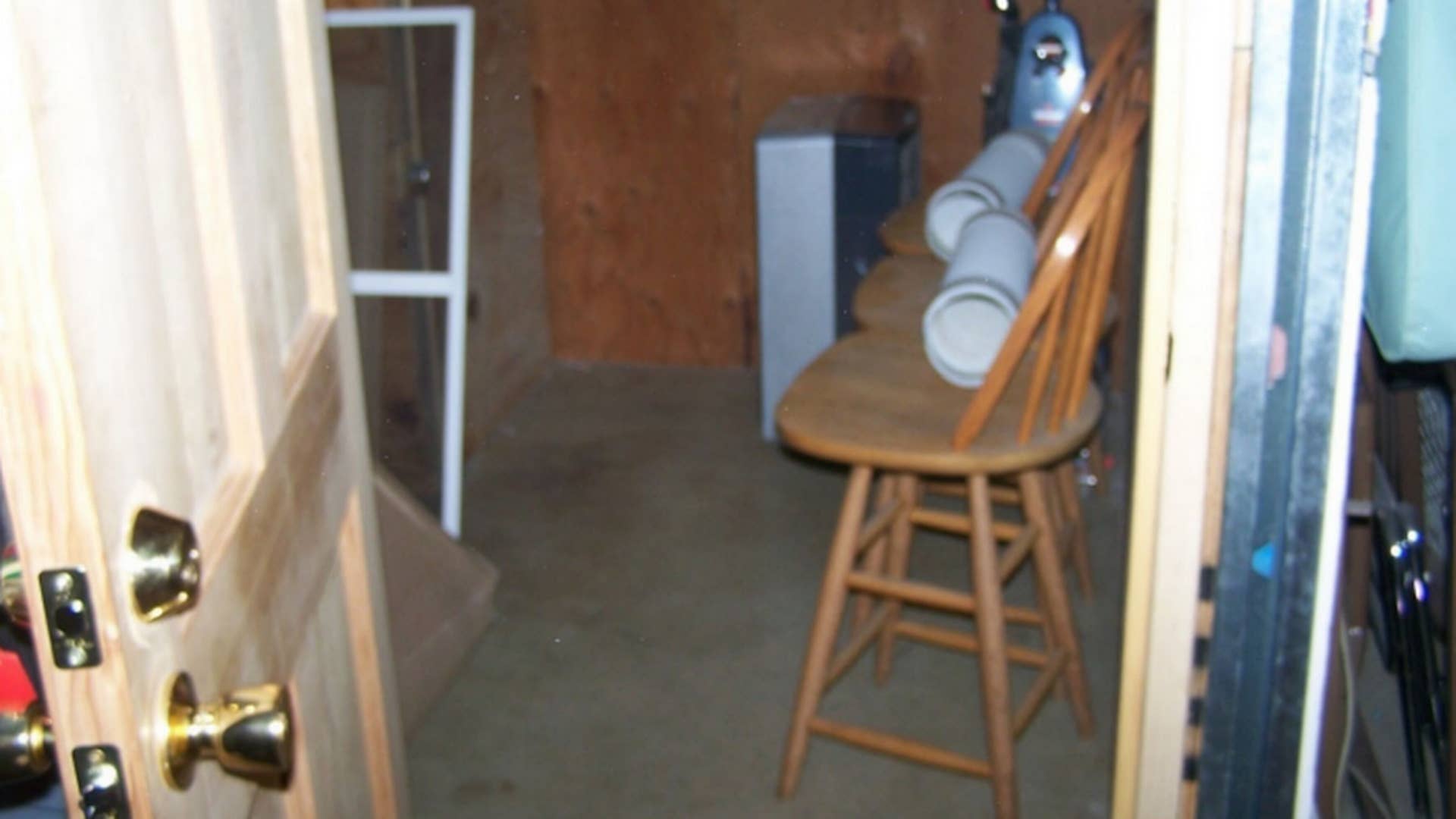 This photo shows the “basement dungeon cell” Olivia Atkocaitis was imprisoned inside when it was photographed by New Boston police in 2011 Read more at: https://www.miamiherald.com/news/nation-world/national/article272018092.html#storylink=cpy