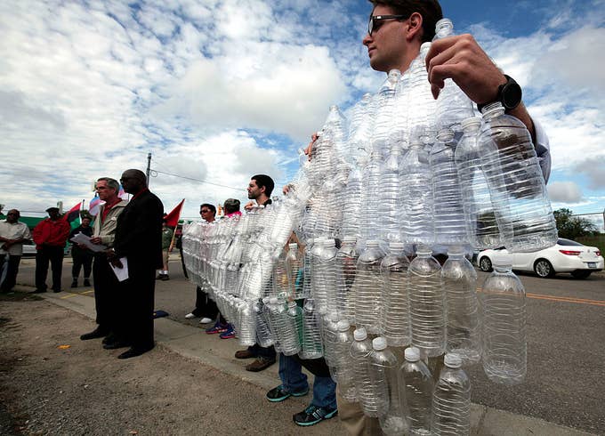 Protestors hold a press conference to protest Donald Trump&#x27;s visit to Flint