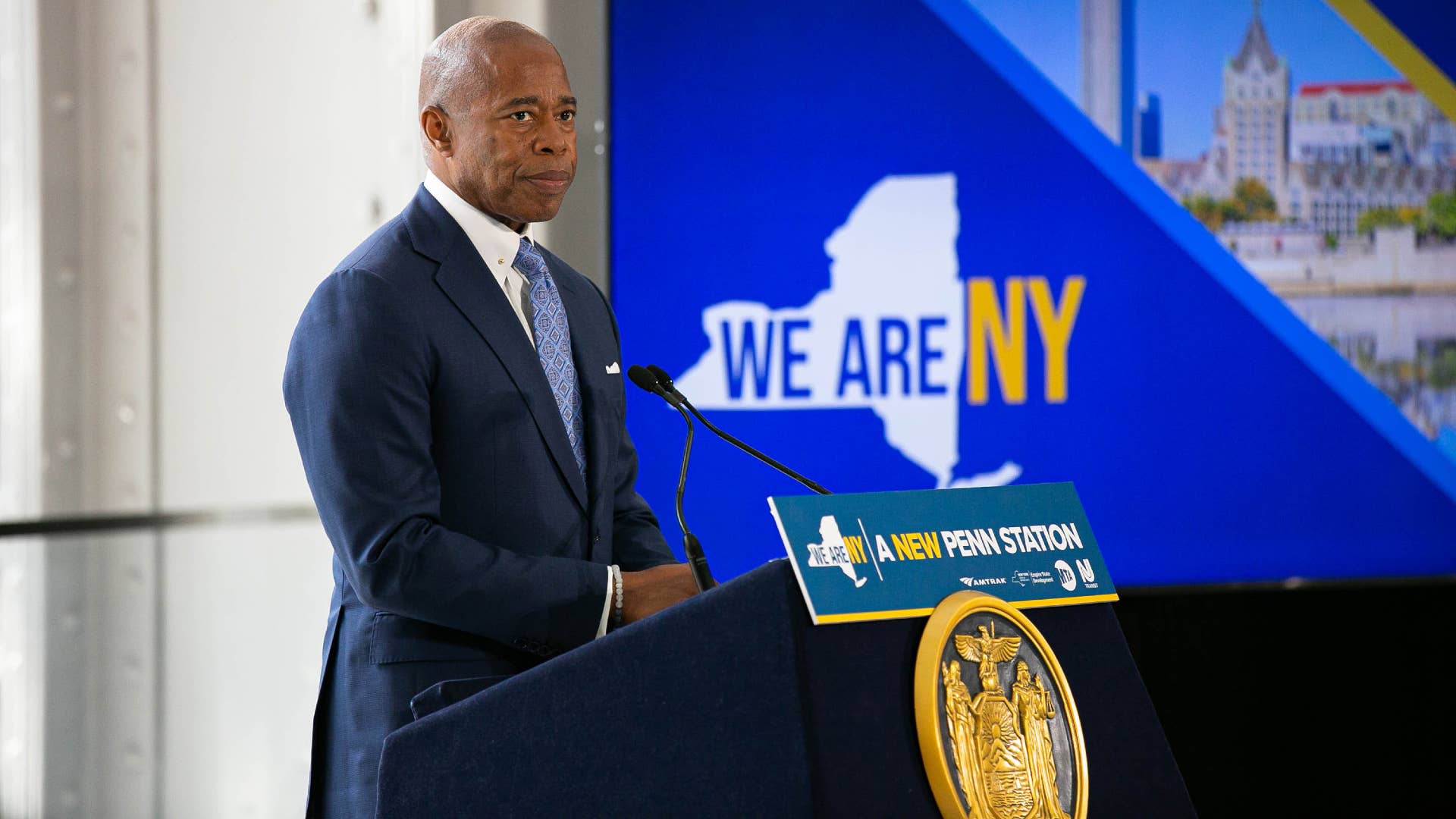 NYC Mayor Eric Adams is pictured at a podium