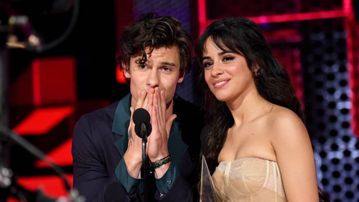 Shawn Mendes and Camila Cabello accept the Collaboration of the Year award onstage.