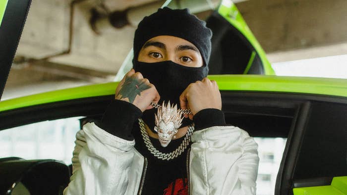 Toronto rapper KILLY poses in a mask