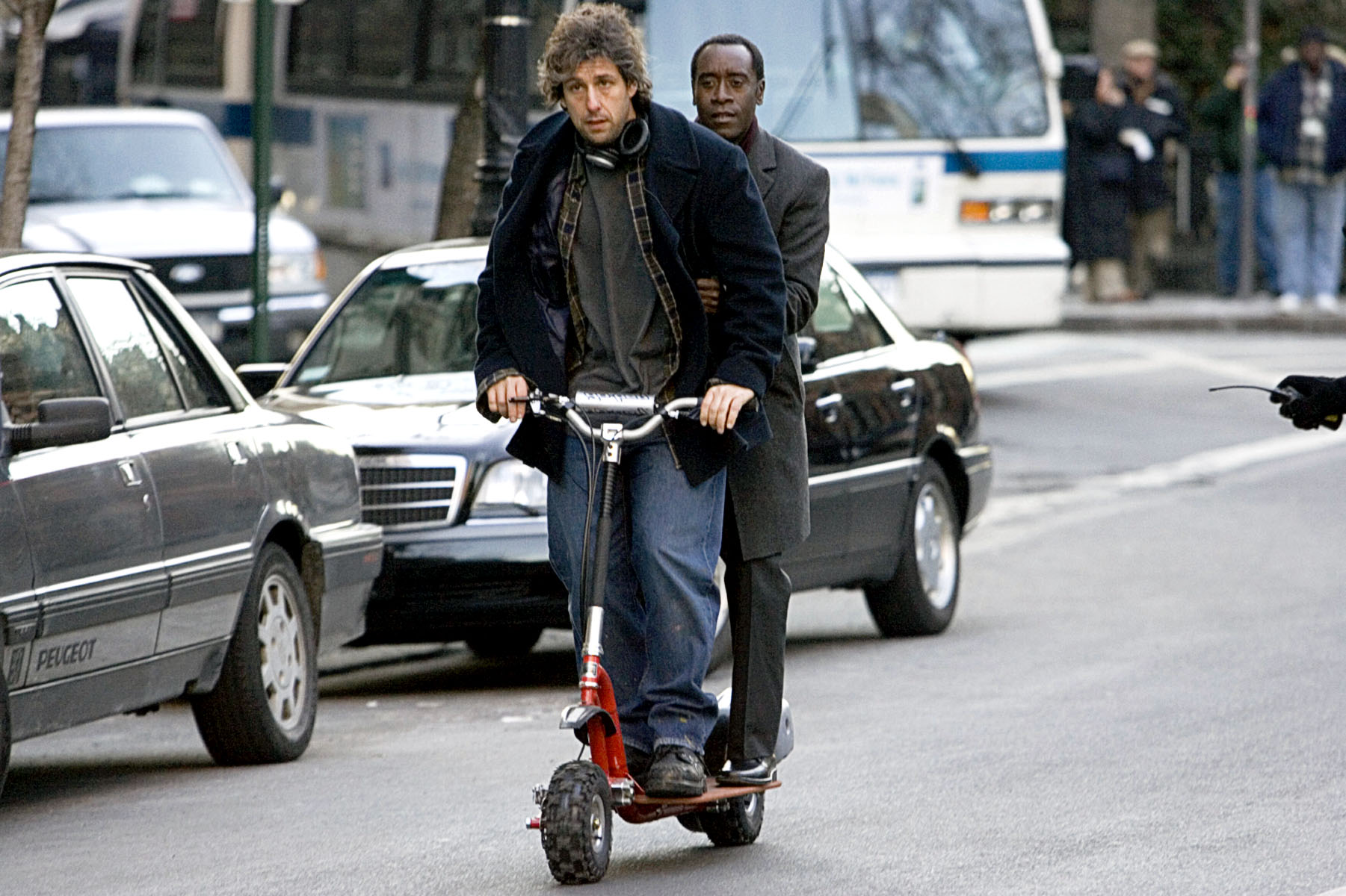 adam sandler and don cheadle on a scooter in nyc