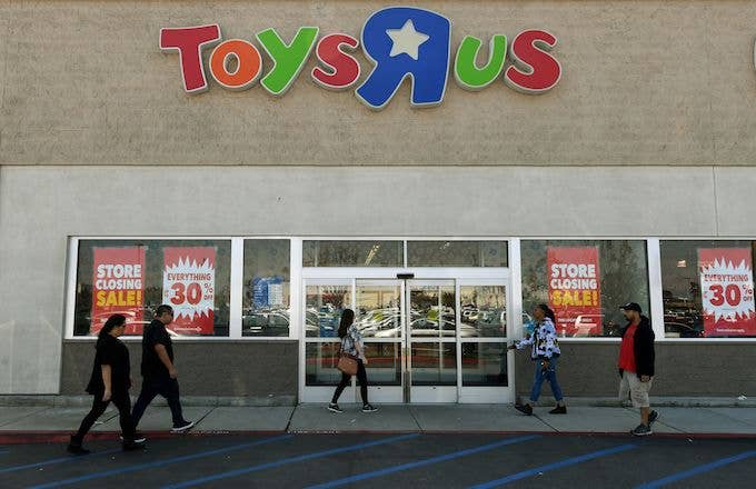 Customers shop at a Toys 'R' Us store.