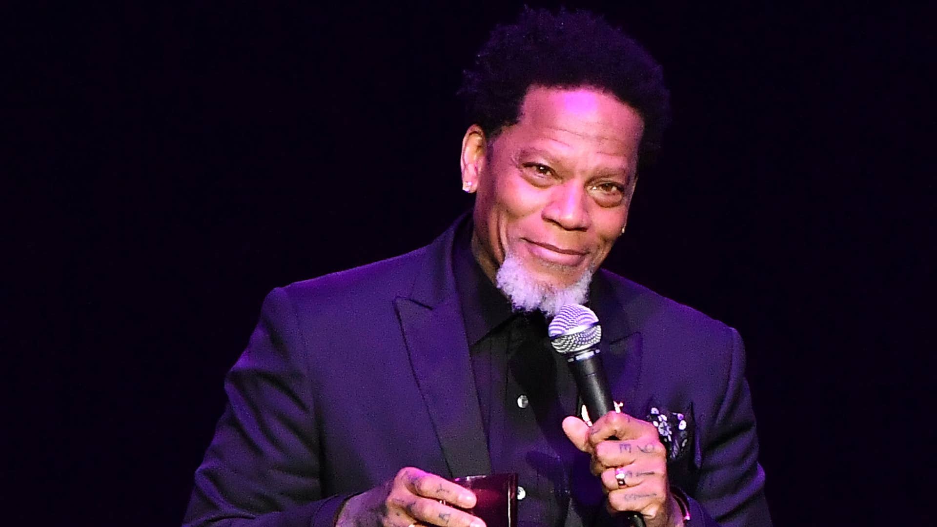Comedian DL Hughley is pictured performing standup