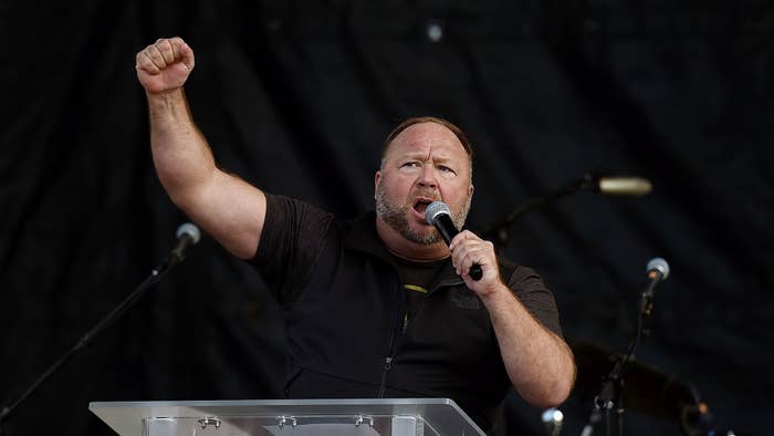 Alex Jones speaks to supporters of US President Donald Trump