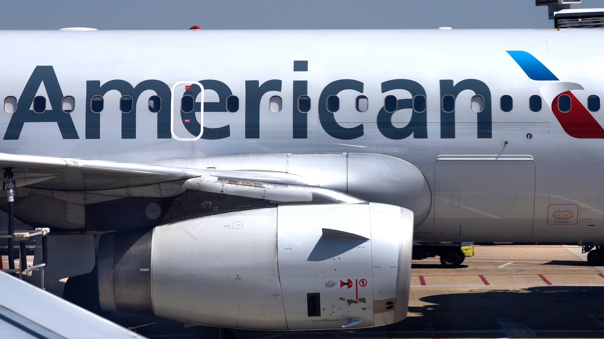 American Airlines passenger aircraft parked at gate at Ronald Reagan Washington National Airport.
