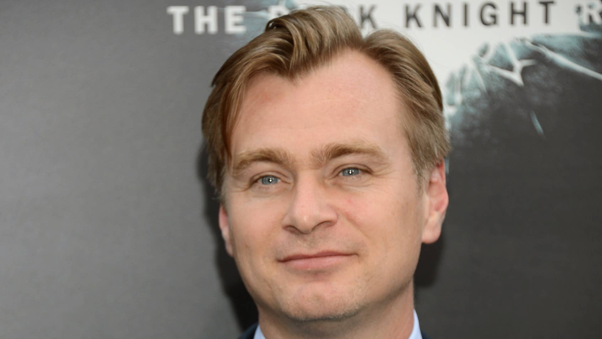 Christopher Nolan attends "The Dark Knight Rises" premiere.