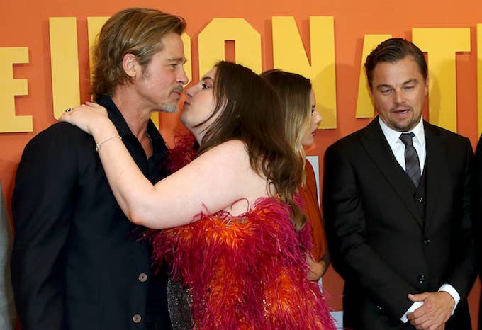 Lena Dunham trying to kiss Brad Pitt