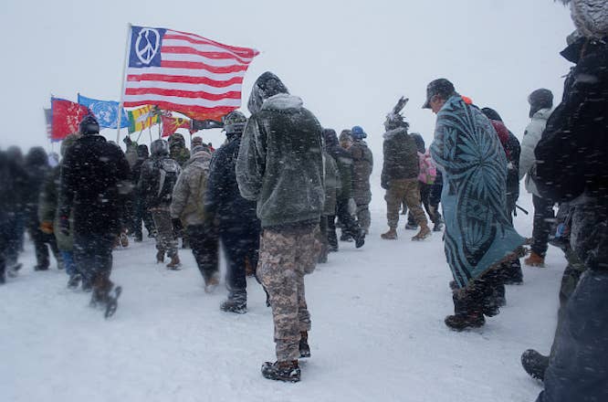 Hundreds of United States military veterans vow to defend the Standing Rock protest camp