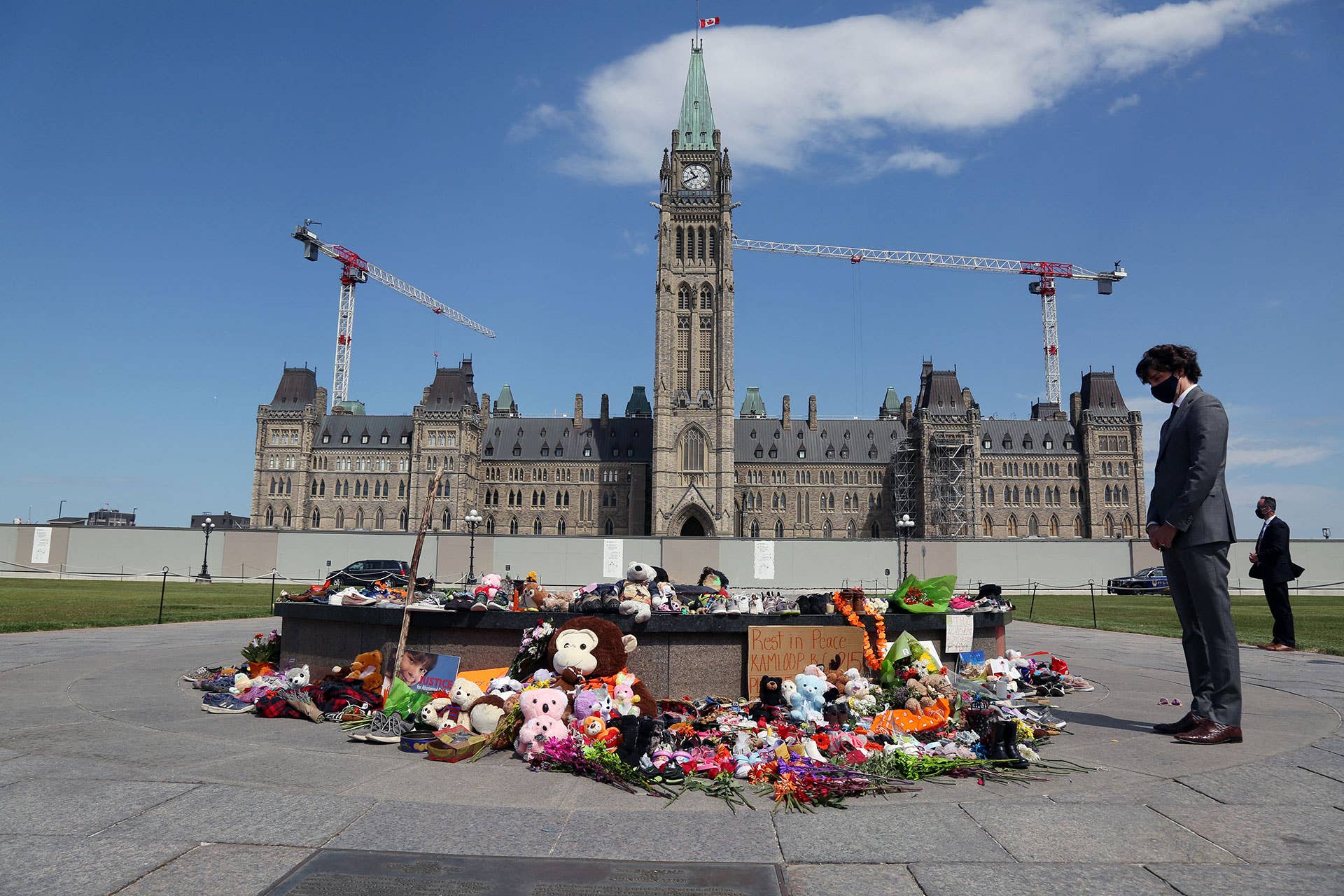 Canadian Prime Minister Justin Trudeau visits the makeshift memorial erected in honor of the 215 indigenous children remains found at a boarding school in British Columbia, on Parliament Hill June 1, 2021 in Ottawa.