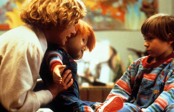 Actress Catherine Hicks and child actor Alex Vincent with Chucky