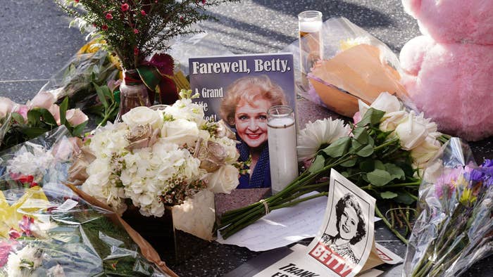 Betty White&#x27;s Walk of Fame star surrounded by flowers