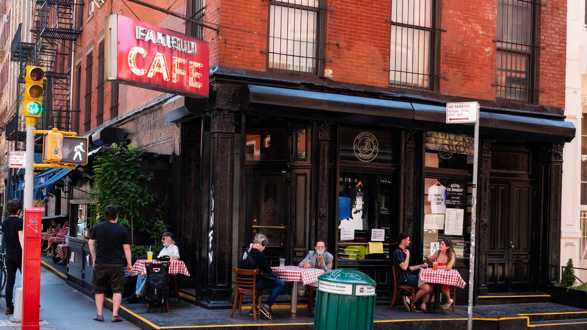 Customers are seen eating outside Fanelli's Cafe in SoHo as the city moves into Phase 2 of reopening.