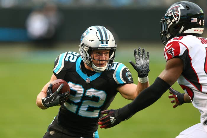 Christian McCaffrey Stiff Arm Panther Falcons 2018