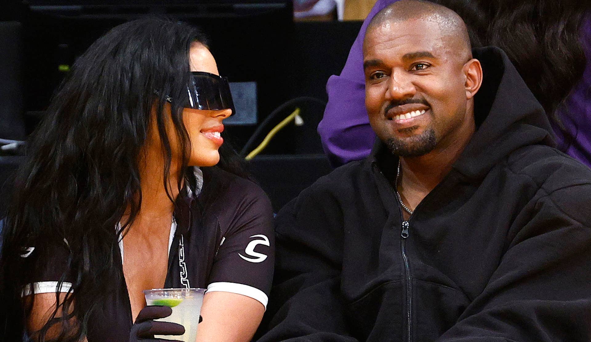 Kanye West and Chaney Jones attend a game between the Washington Wizards and Los Angeles Lakers