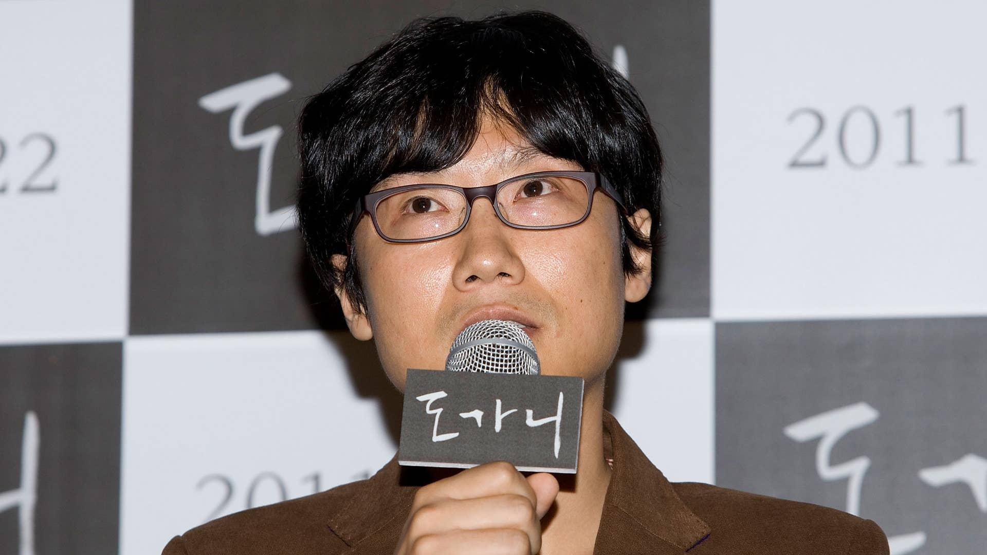 'Squid Game' director Hwang Dong-Hyuk speaks with reporters.
