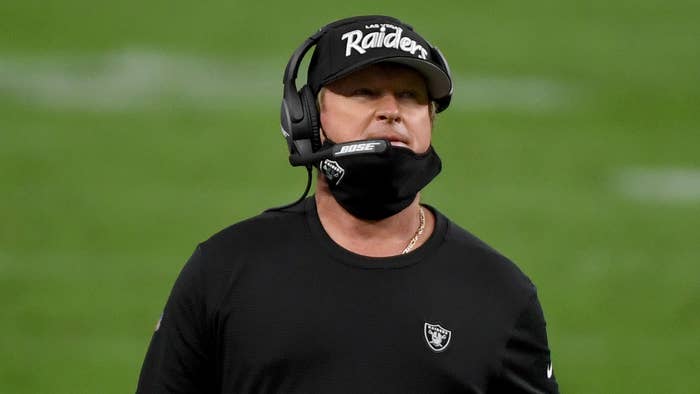 Jon Gruden wears a protective face mask incorrectly on the sideline against the Bills.