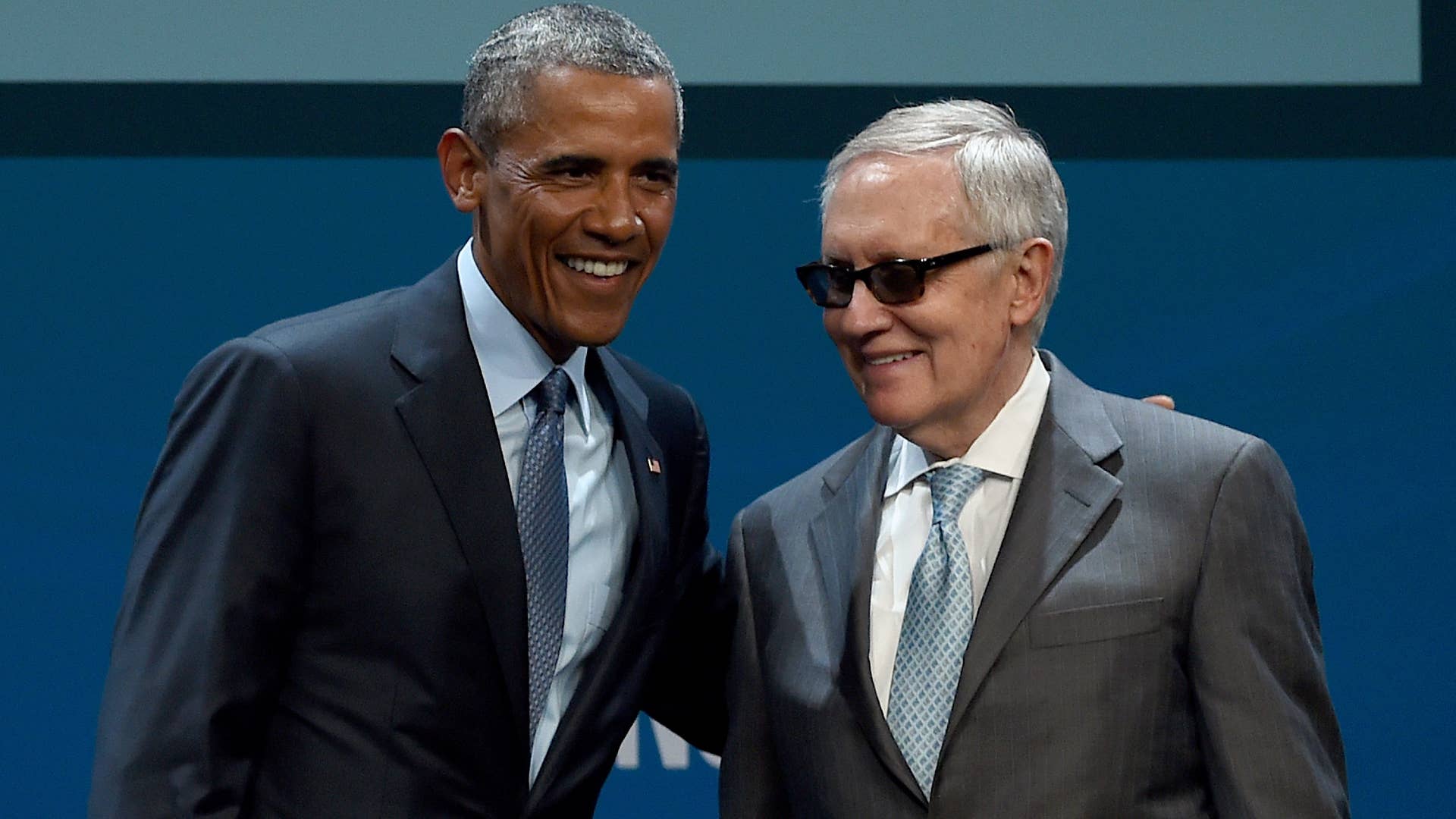 Barack Obama and Harry Reid take a photo