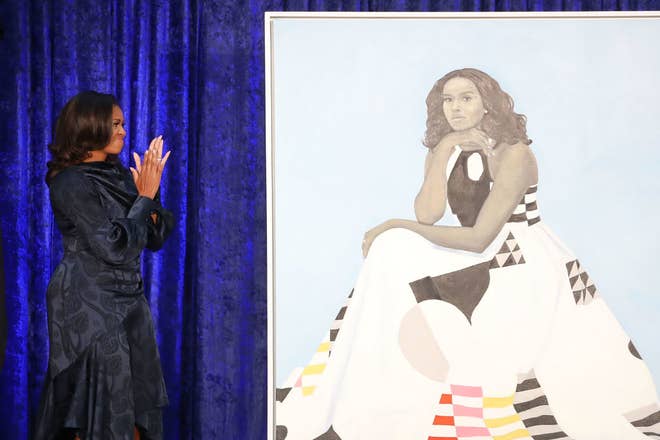 Michelle Obama with her portrait at the Smithsonian&#x27;s National Portrait Gallery.