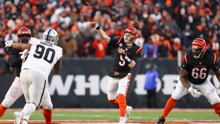 Cincinnati Bengals quarterback Joe Burrow (9) passes the ball during the Wild Card game