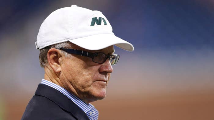 New York Jets owner Woody Johnson watches the pregame warm ups