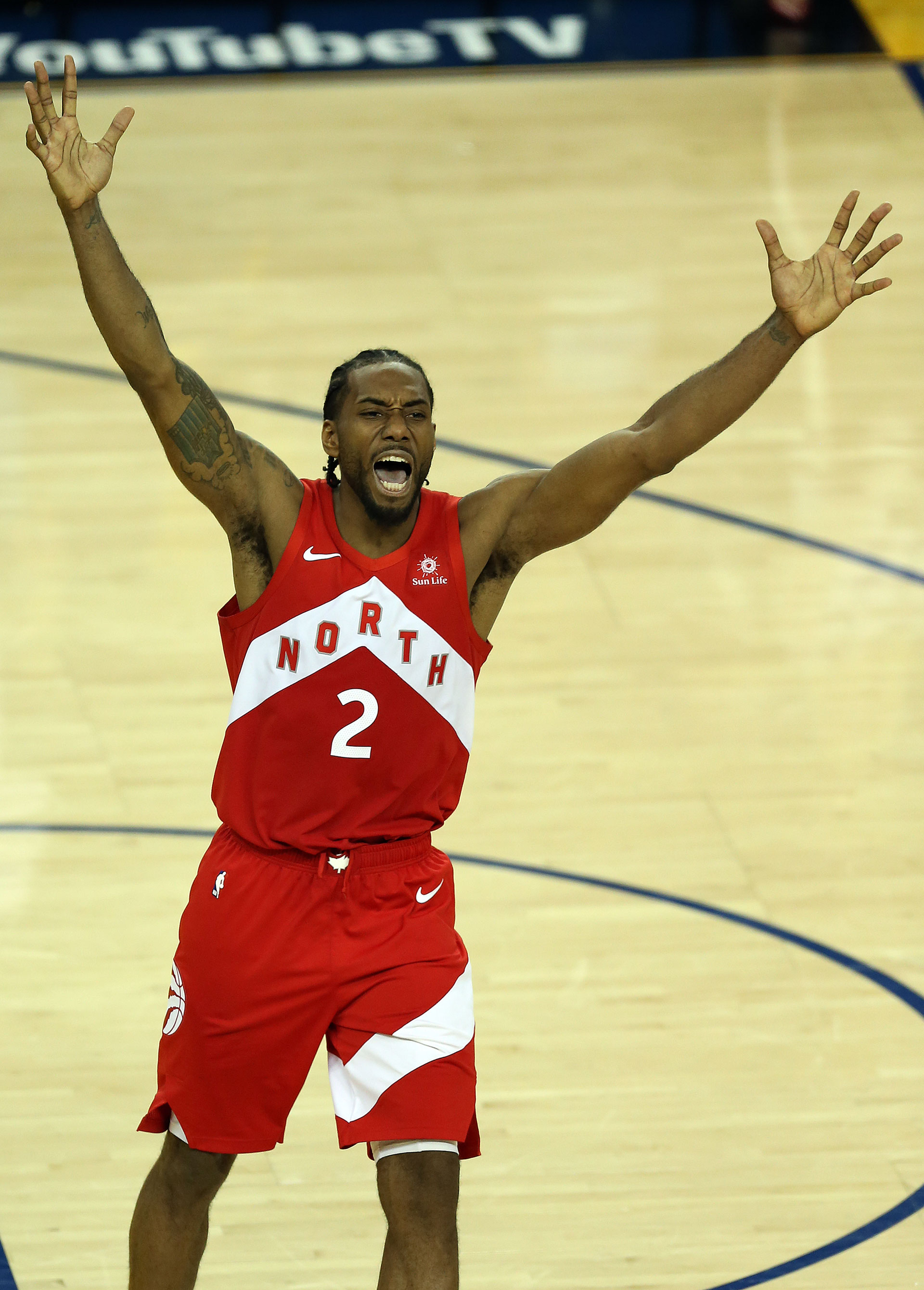 Kawhi Leonard of the Toronto Raptors celebrates an NBA Championship