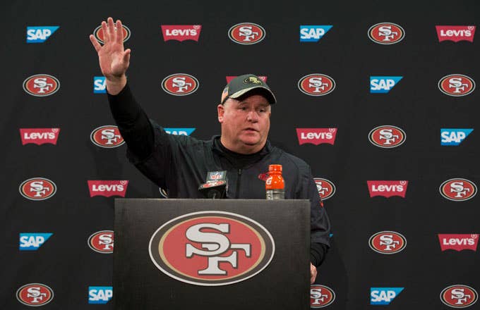 Chip Kelly waves goodbye to the press after his final press conference as the 49ers coach.