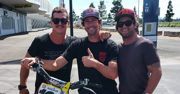 Titans Greg Bird and Beau Falloon pictured with Travis Pastrana
