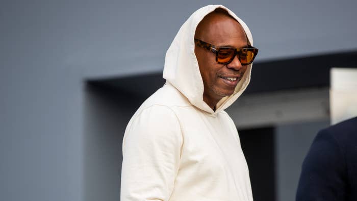 Dave Chappelle is seen outside Dior during Paris Fashion Week.