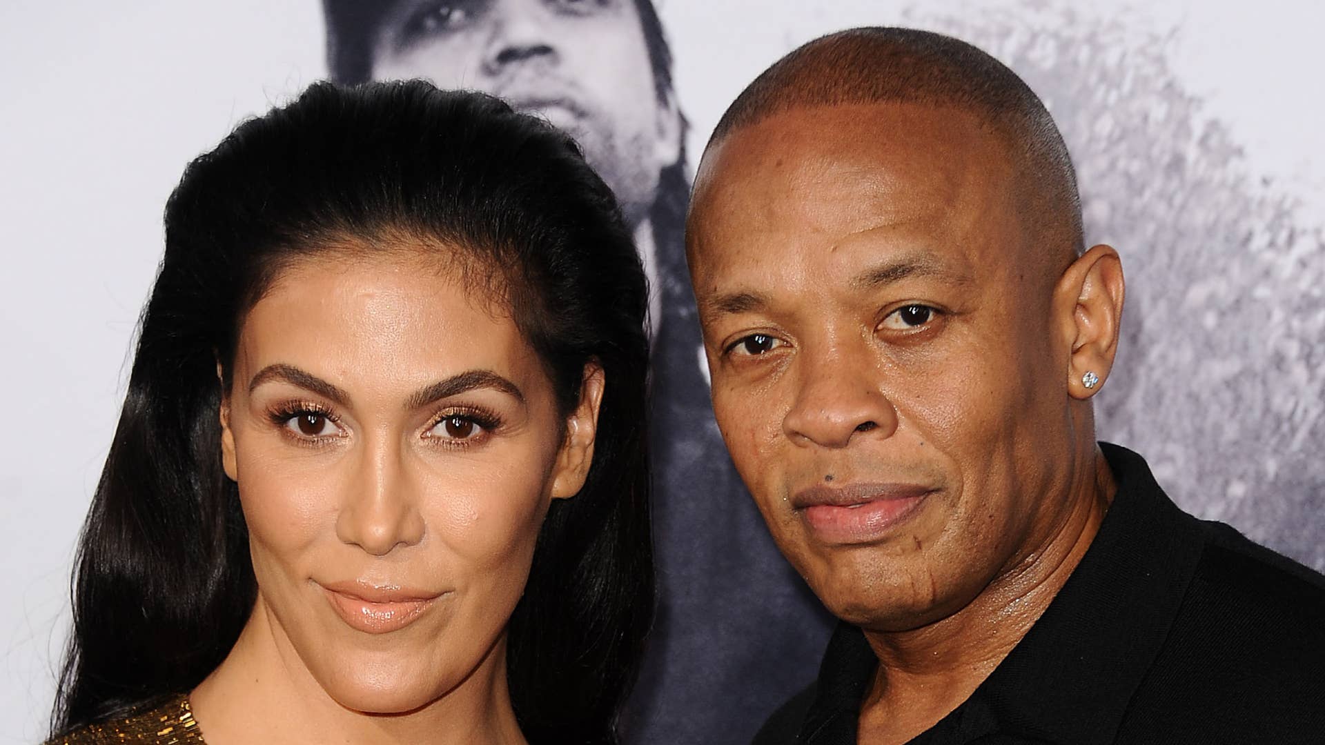 Dr. Dre and wife Nicole Young attend the premiere of "Straight Outta Compton."