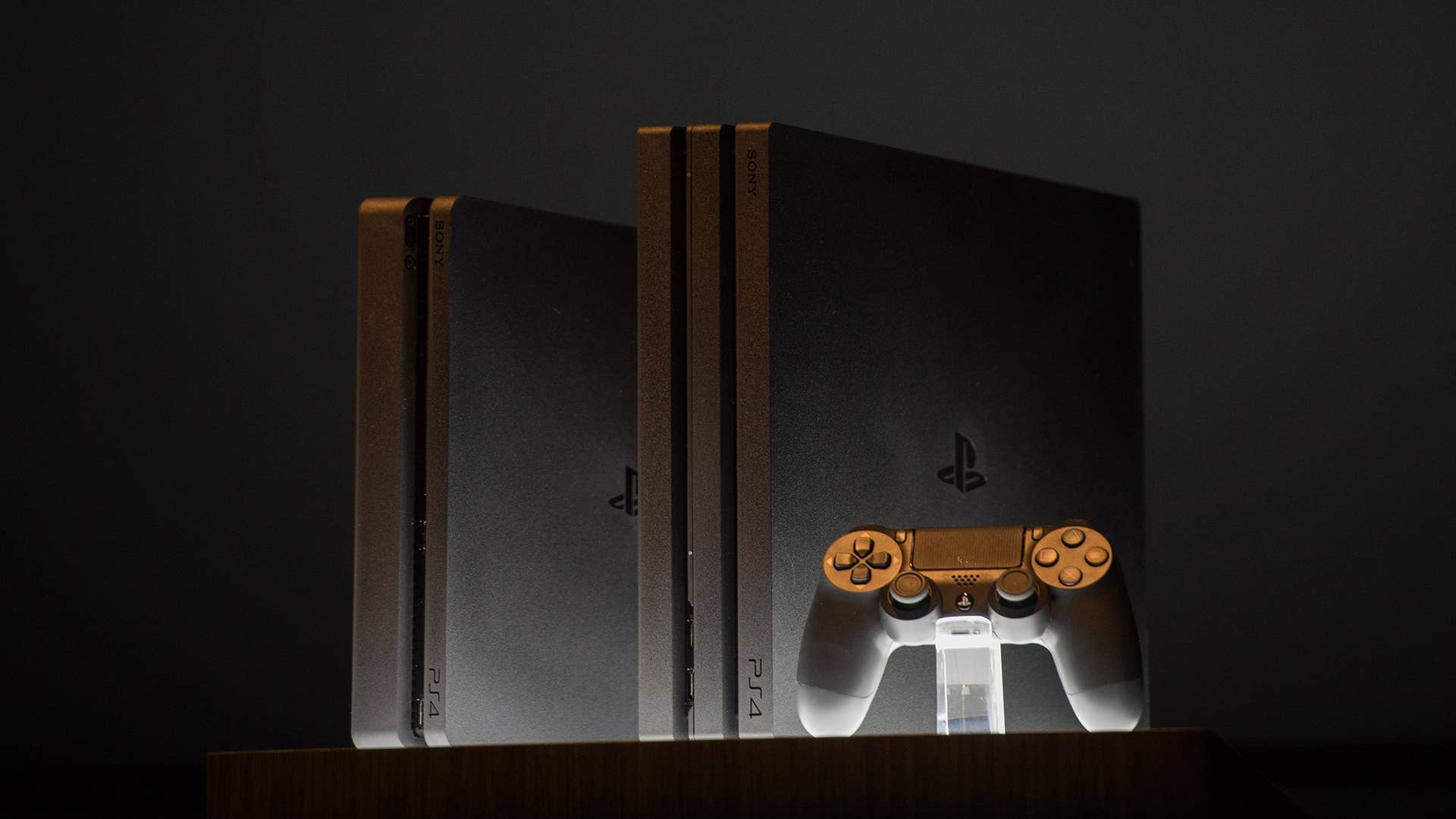 The PlayStation 4 hardware revision, and the PlayStation 4 Pro at Sony's reveal event in 2016.