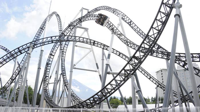 People react as they ride on Fuji-Q Highland amusement park world&#x27;s steepest roller coaster &quot;Takabisha.&quot;