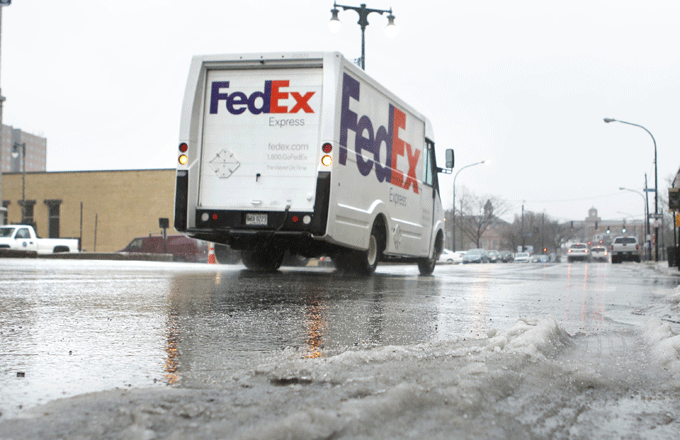 A FedEx truck makes the rounds during the 2014 holiday season.