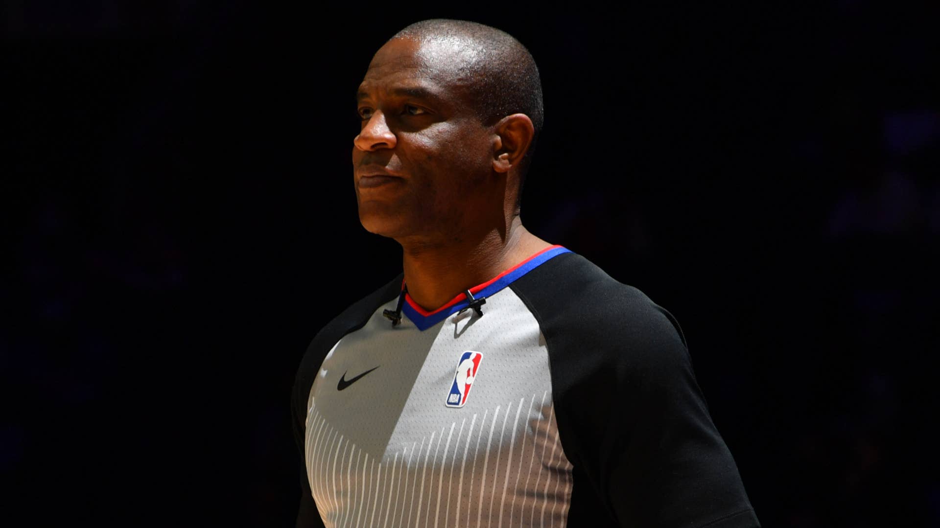 NBA Referee Tony Brown looks on during a game.