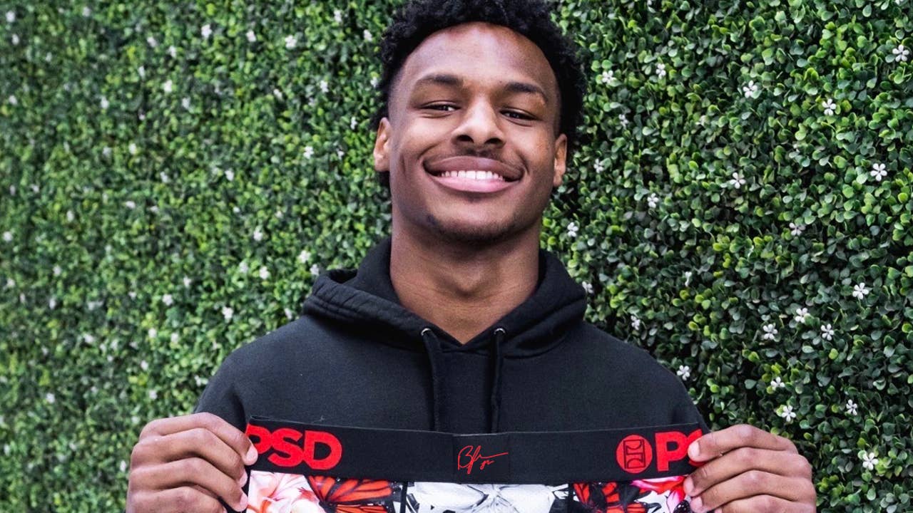 Bronny James is pictured holding up signature underwear