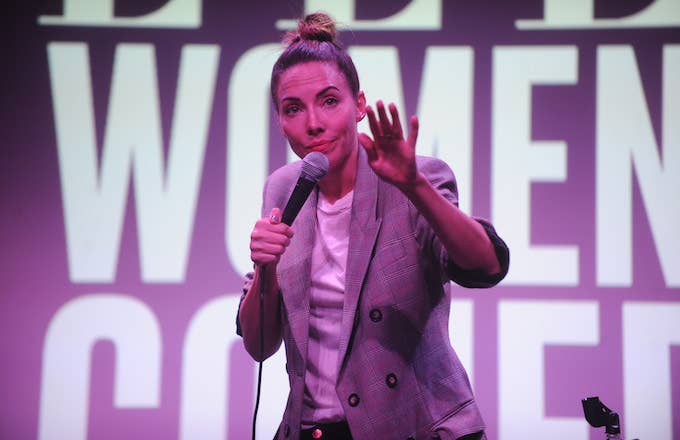 Whitney Cummings performs on stage as ELLE hosts Women In Comedy event.