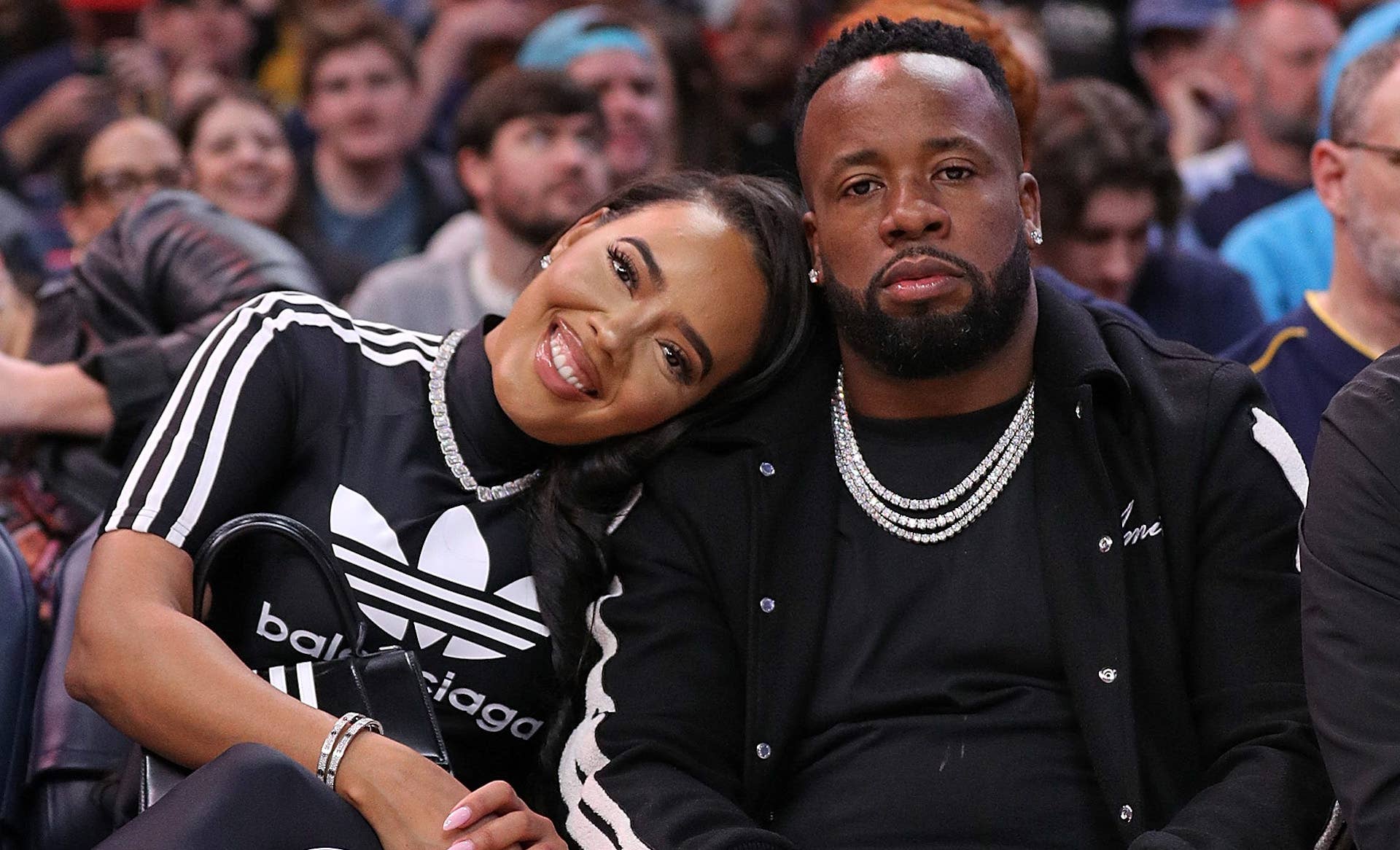 Yo Gotti and Angela Simmons appear at Memphis Grizzlies game