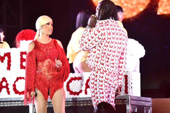 : Singer Cardi B is presented a &#x27;Take Me Back&#x27; card onstage by Offset.