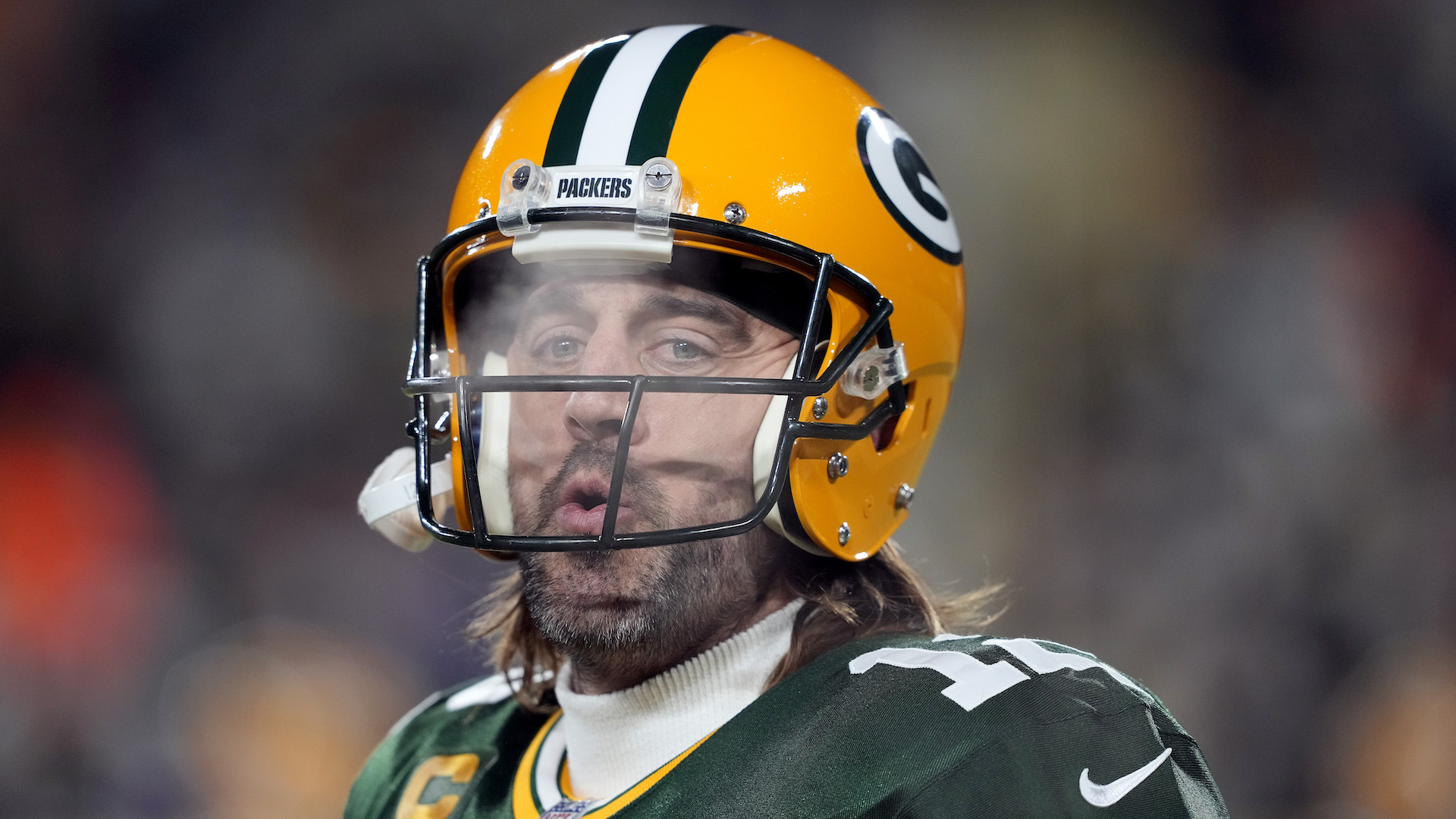 Green Bay Packers quarterback Aaron Rodgers (12) warms up prior to