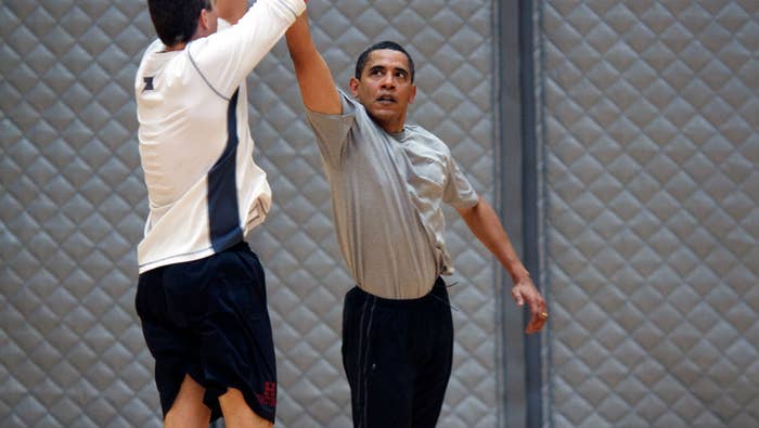 Barack Obama plays basketaball against Arne Duncan at Fort McNair in 2009.