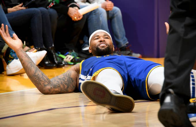 DeMarcus Cousins enjoys a laugh during the game against the Los Angeles Lakers
