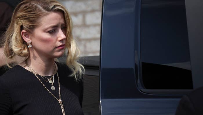 Amber Heard exits court in 2022