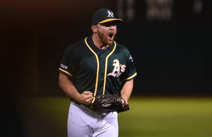 Liam Hendriks celebrates after recording the final out in the ninth inning.